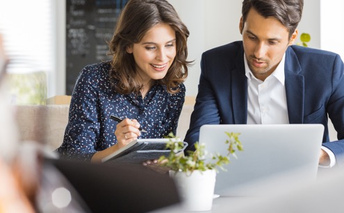 couple looking at a laptop